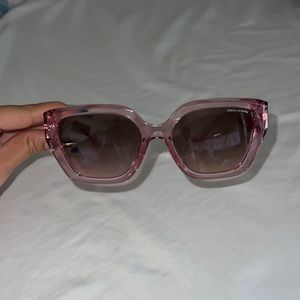 Pink Armani Exchange sunglasses.